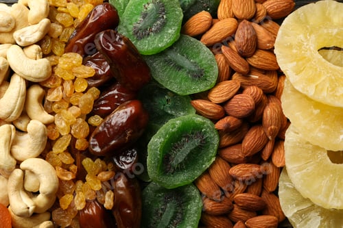 Preview: Different dried fruits and nuts on whole background
