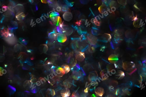 Preview: Abstract defocused black background with shining glitter.Good as overlay layer.