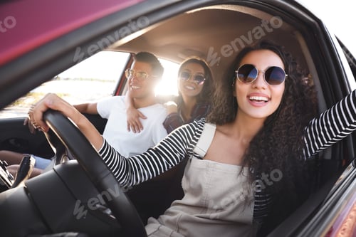 Preview: Happy friends together in car on road trip