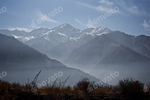 Preview: Snow on tops of the autumn mountains