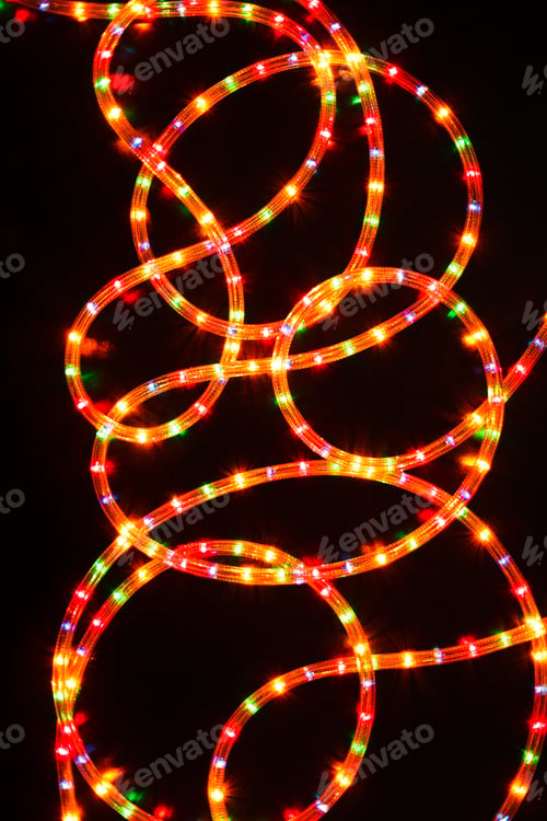Preview: Colored light christmas garland illumination background, unfocused.