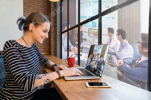 Preview: Hipster young Woman freelancer using the technology laptop having video conference