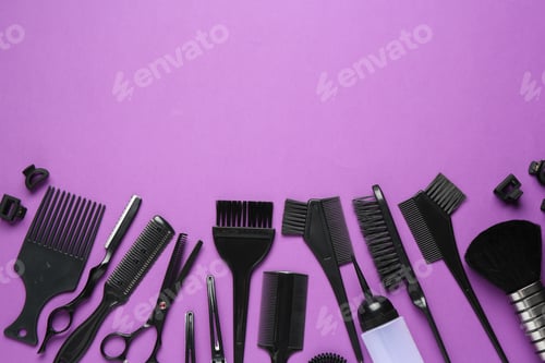 Preview: Different hairdresser's tools on violet background, flat lay. Space for text