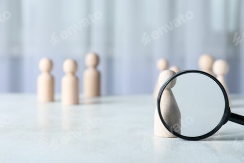 Preview: Magnifying glass and wooden figures on light background, space for text