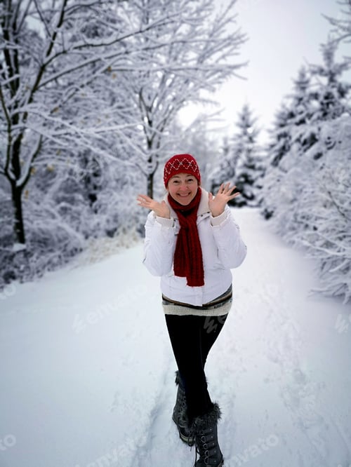 Preview: Happy joyful woman dressed in winter jacket smiling at camera, Winter is here.