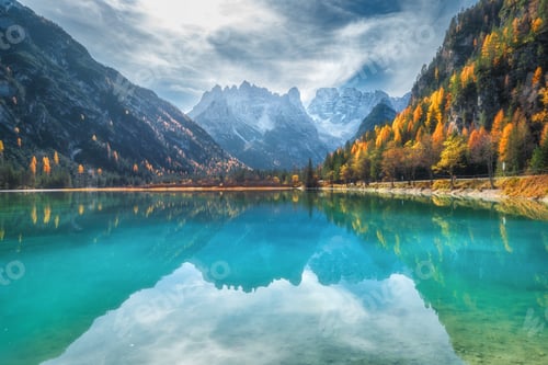 Preview: Mountain lake with reflection at sunny autumn day