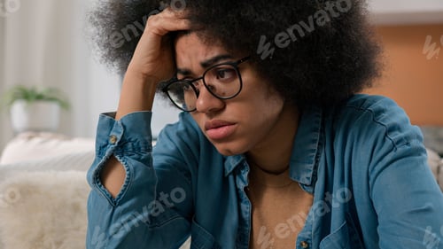 Preview: Sad worried African American woman upset suffer stress psychological problem anxiety depression