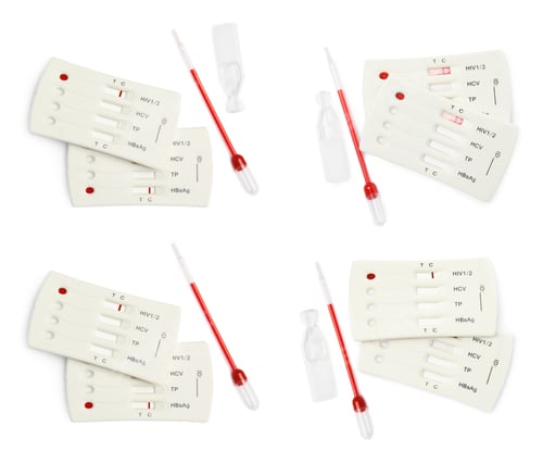 Preview: Set with disposable express test kits for hepatitis on white background, top view