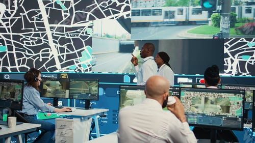 Preview: Employees team monitoring delivery cars in traffic via CCTV radar footage