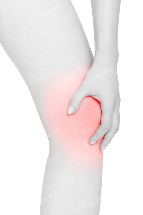 Preview: Young woman holds her hand on knee, red pain area isolated on wh