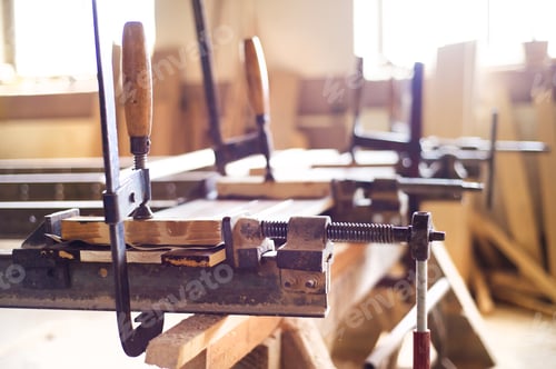 Preview: Carpenter gluing wooden planks