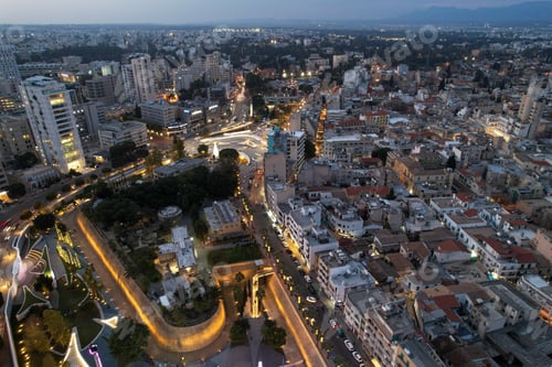 Preview: Aerial drone photograph of cityscape of Nicosia in Cyprus at sunset