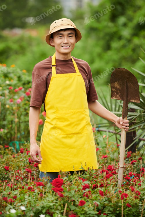 Preview: Worker Digging out Blooming Flowers