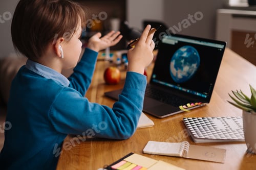 Preview: Online learning, boy using laptop