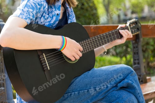 Preview: Man playing guitar close-up