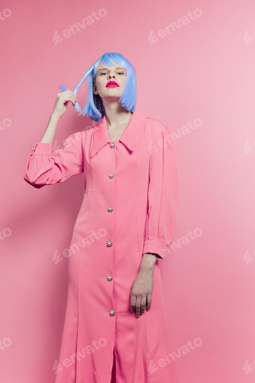 Preview: portrait of a woman in blue wig pink dress red lips isolated background