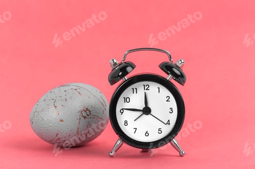 Preview: Easter alarm clock with colorful egg. Time to celebrate