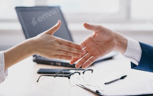 Preview: Handshake gesturing hands laptop office work window
