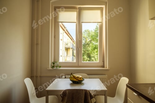 Preview: Small wooden table is set up with ripe yellow bananas on top