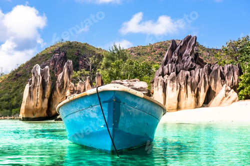 Preview: Old fishing boat on Tropical beach at Curieuse island Seychelles