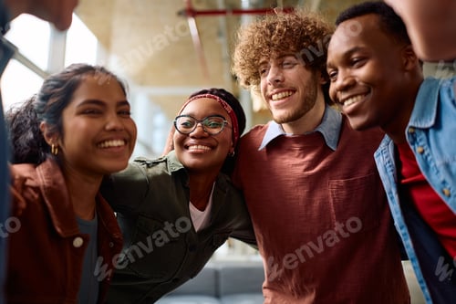 Preview: Multiracial group of happy college friends having fun together.