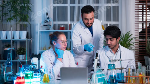 Preview: A group of young scientists are conducting experiments in the lab using a microscope.