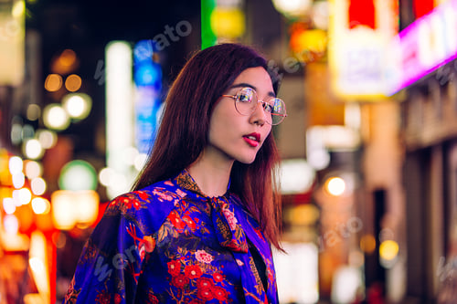 Preview: Pretty asian woman portrait with led lights