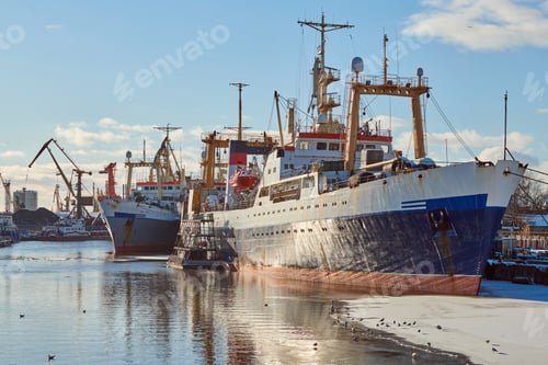 Preview: Moored ships and harbor cranes in port