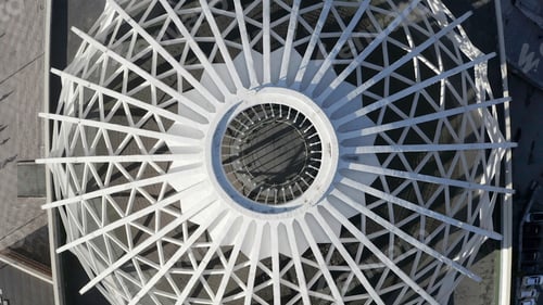 Preview: Bird's-eye view.Stock footage.View of the white monument as an arch with a transparent top next to