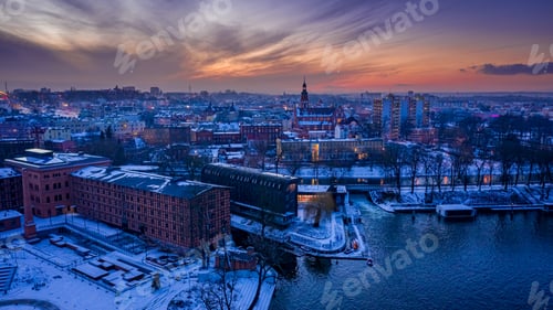 Preview: Bydgoszcz and frozen Brda river at dusk in winter, Poland