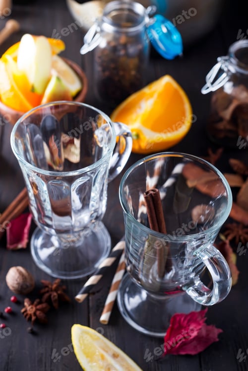 Preview: Christmas mulled wine ingredients and glass on dark wooden background