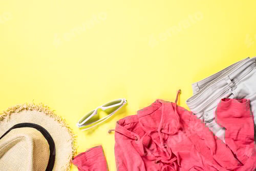 Preview: Summer Vacation Clothing and Accessories on Yellow Background