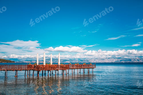 Preview: Wooden pier with cafe in Ionian sea. Greece