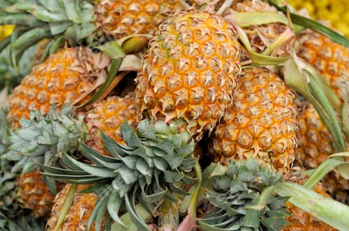 Preview: Lot of pineapple fruit background
