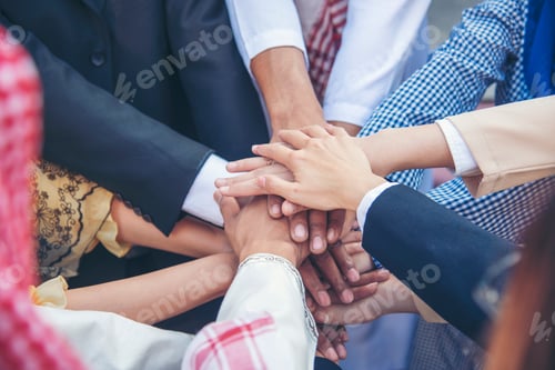 Preview: Diversity multiethnic high five group of business people success team hands together