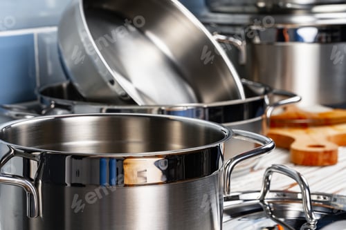 Preview: Set of aluminum cookware on kitchen counter