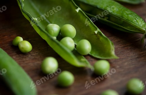 Preview: Close up of a green pea pod food photography recipe idea