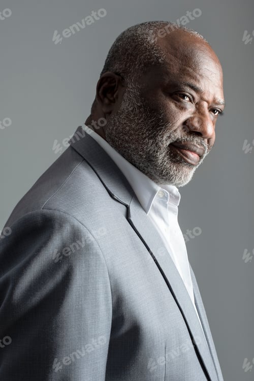 Preview: African American businessman in gray suit studio portrait