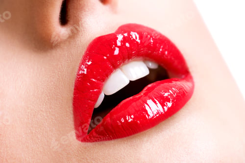Preview: Closeup beautiful female lips with red lipstick.