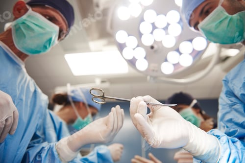 Preview: Surgeons passing scissors to each other