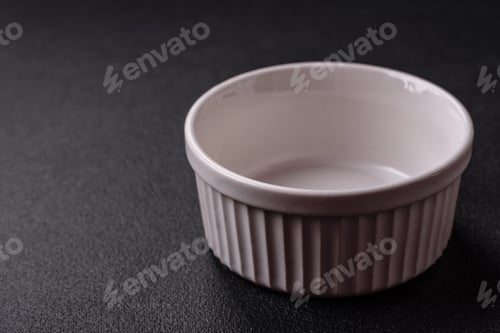 Preview: Beautiful empty white ceramic gravy boat on a concrete background