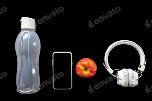 Preview: Flat lay composition with sports equipment on black.