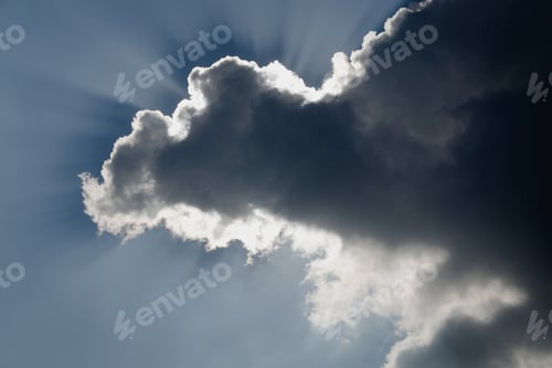 Preview: Beautiful cloudscape over horizon. Sun hide behind cloud. Deep blue sky