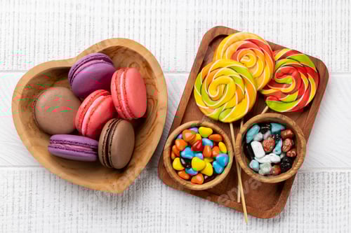 Preview: Various colorful candies, lollipops, and macaroons
