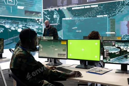 Preview: Army personnel monitors isolated green screen and surveillance footage