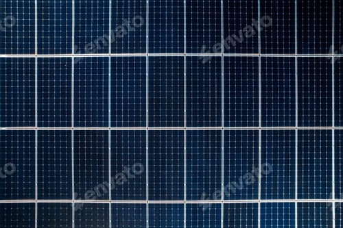 Preview: Multiple solar panels on the roof of a manufacturing building