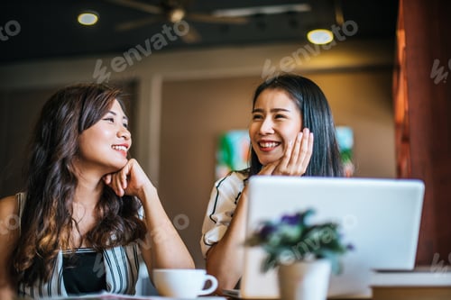 Preview: Two beautiful women talking everything together at coffee shop cafe
