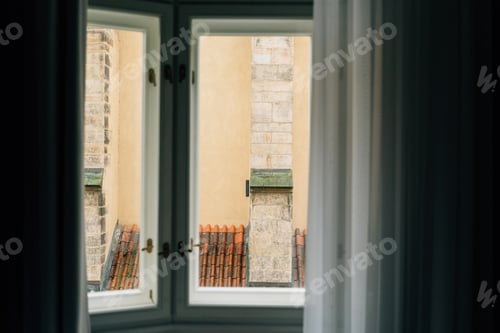Preview: Window view from old European building in Prague