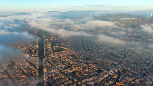 Preview: Aerial view of Barcelona City above the clouds and fog, Catalonia, Spain