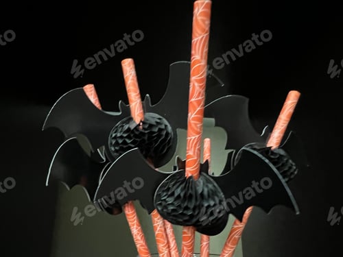 Preview: Orange Recyclable straws with bats attached for Halloween
